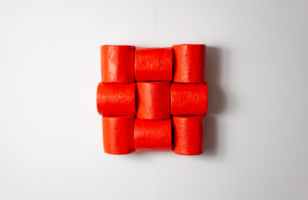 Untitled (red), 2023, a sculpture in plaster cloth and cardboard
